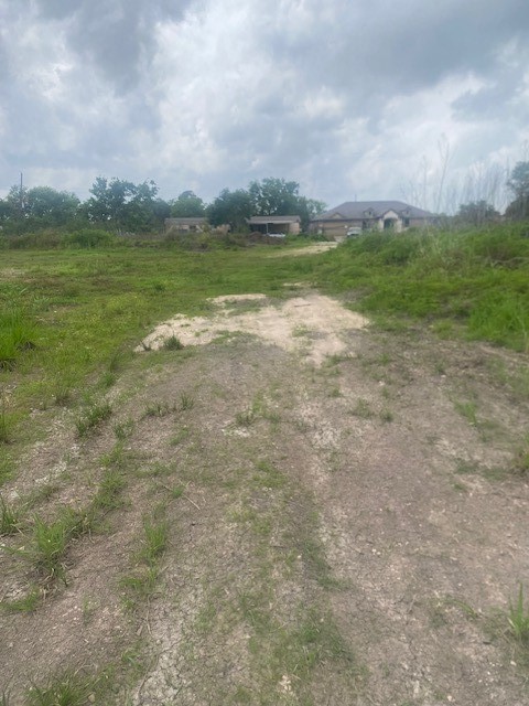 0 Cr 383 Rosharon Tx 77583 Rosharon, TX 77583 - Photo 23 of 44 a view of a lake with houses in the back
