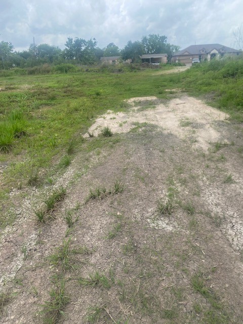 0 Cr 383 Rosharon Tx 77583 Rosharon, TX 77583 - Photo 28 of 44 a view of a lake with a city