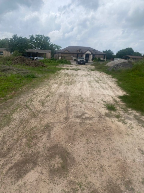 0 Cr 383 Rosharon Tx 77583 Rosharon, TX 77583 - Photo 6 of 44 a view of a lake with houses in the back