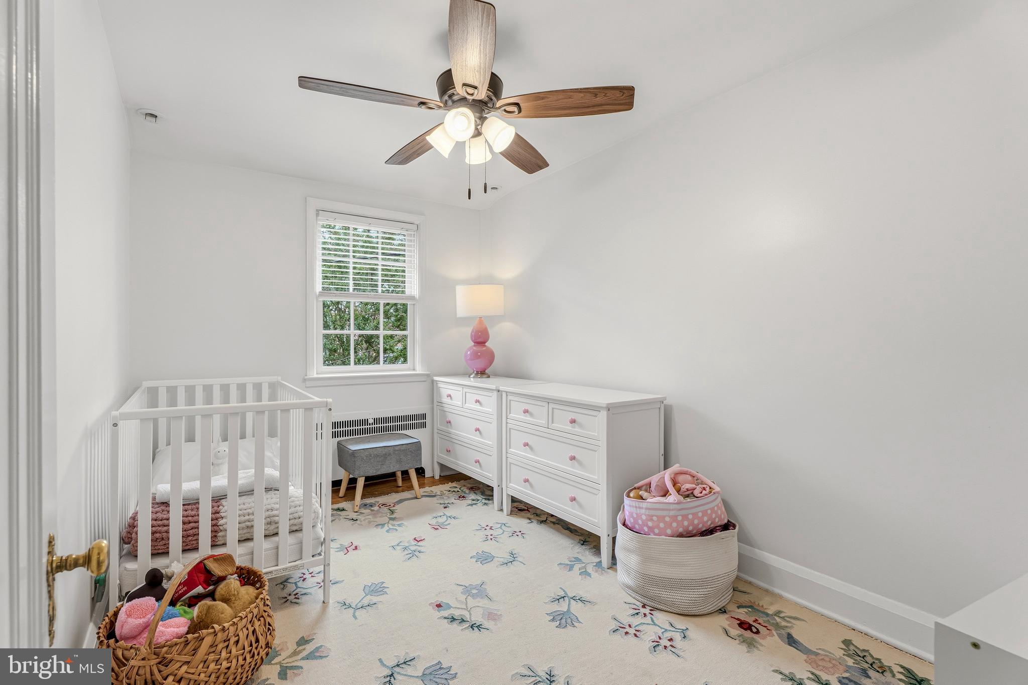 314 Murdock Road Baltimore, MD 21212 - Photo 22 of 42 a room with a baby bed furniture and a window