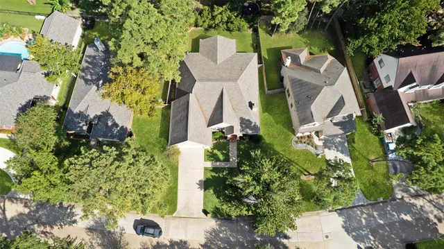a view of a lake in middle of the forest