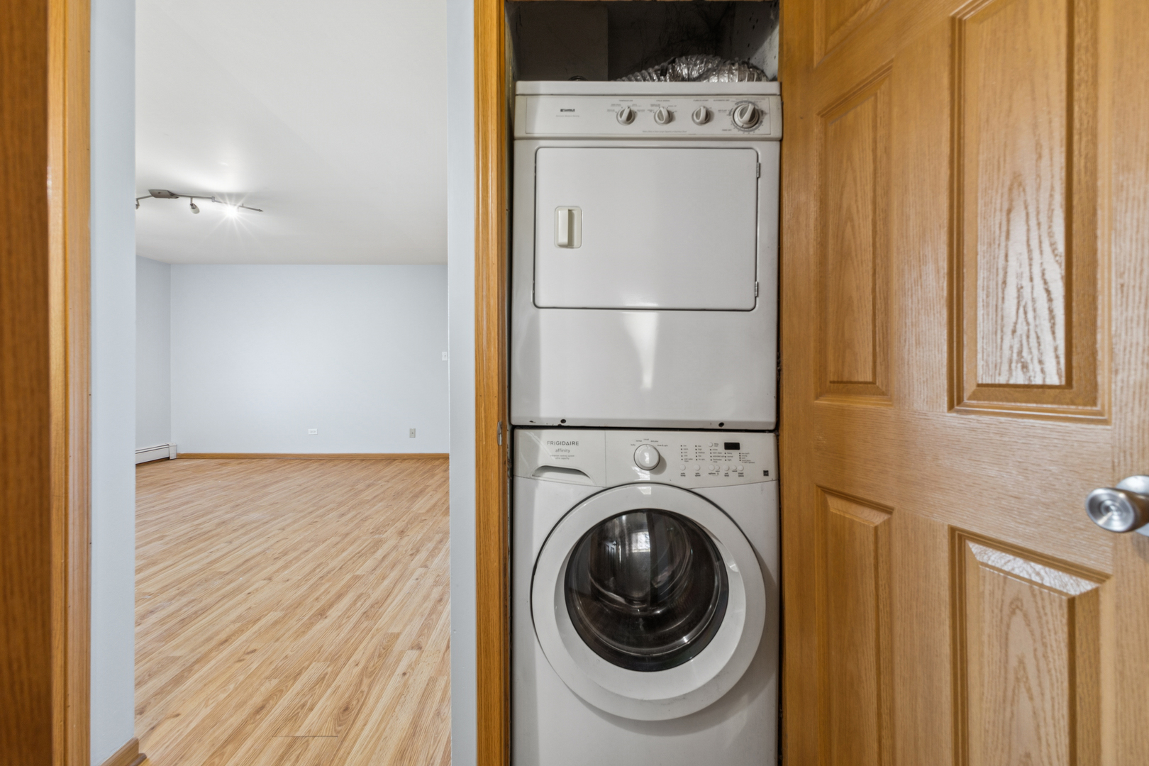17220 71st Avenue, Unit 11 Tinley Park, IL 60477 - Photo 16 of 20 a utility room with dryer and washer