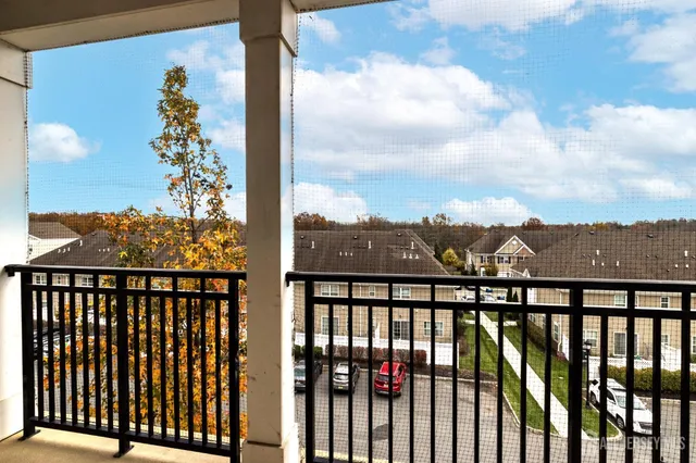 a view of city and mountain from a balcony