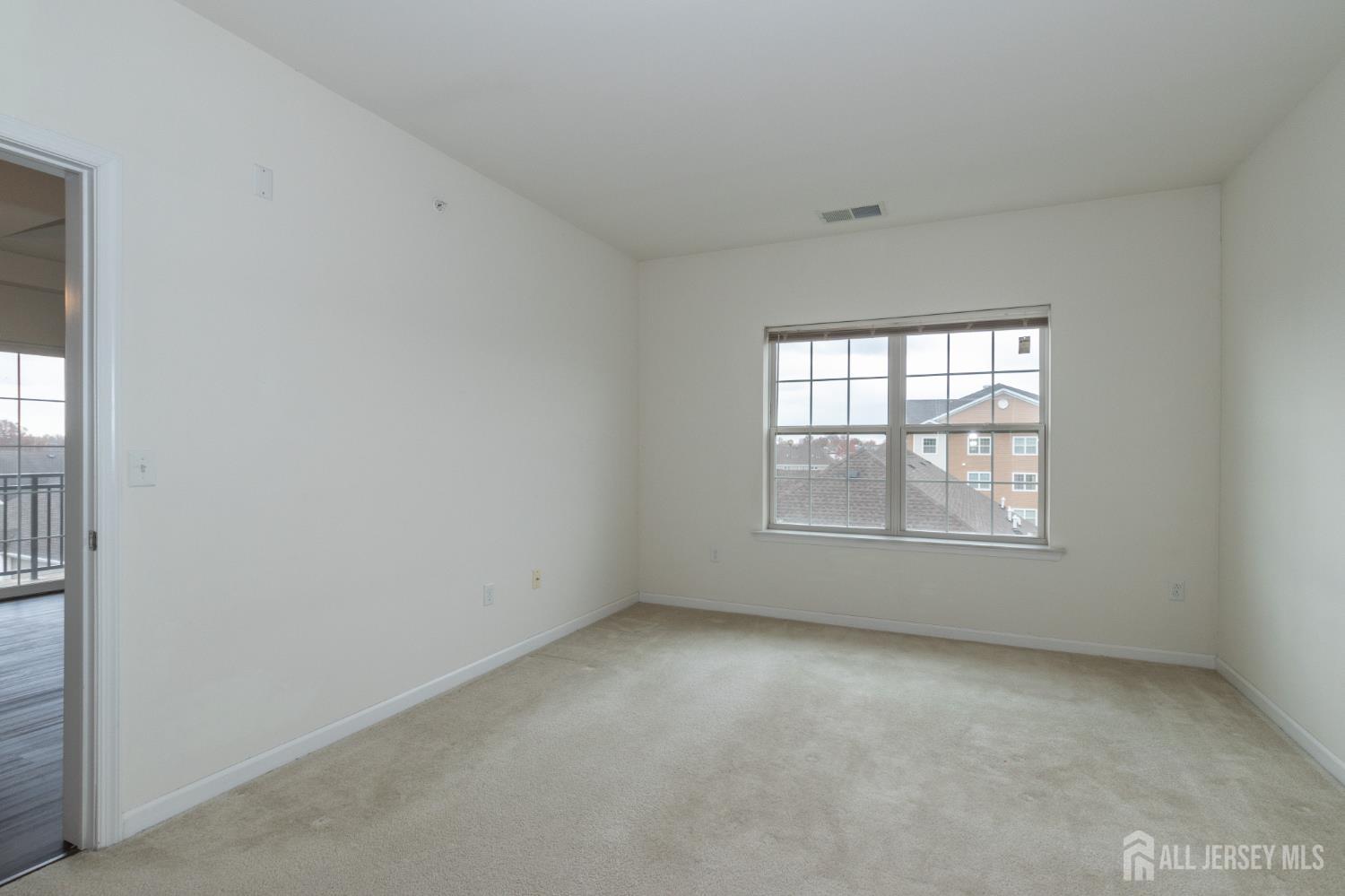 541 East Celebration Way South Plainfield, NJ 07080 - Photo 20 of 35 an empty room with a window