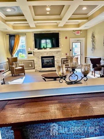 a view of a living room and window