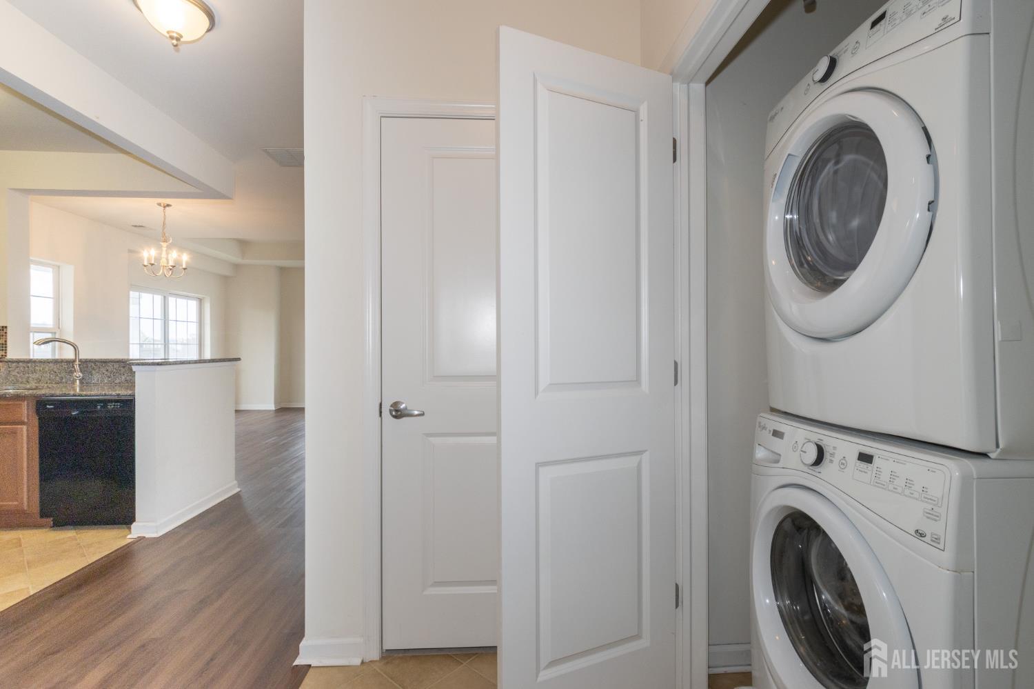 541 East Celebration Way South Plainfield, NJ 07080 - Photo 8 of 35 a view of a hallway with washer and dryer