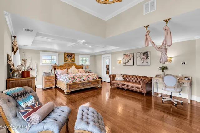 a view of walk in closet with clothes