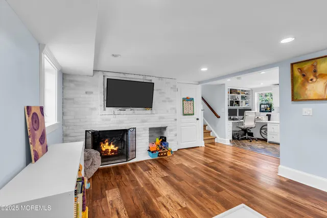a view of a patio with table and chairs and potted plants