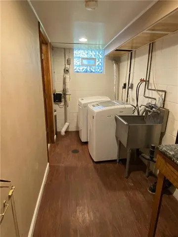 a room with a sink and a window