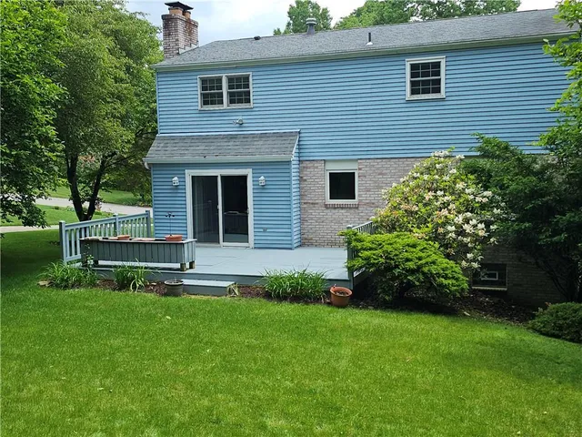 a house view with a garden space