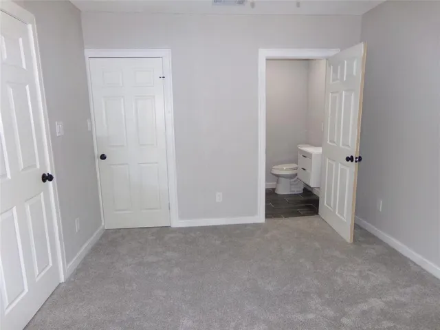 a view of a room with a wardrobe space