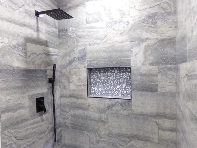 a stone house with shower