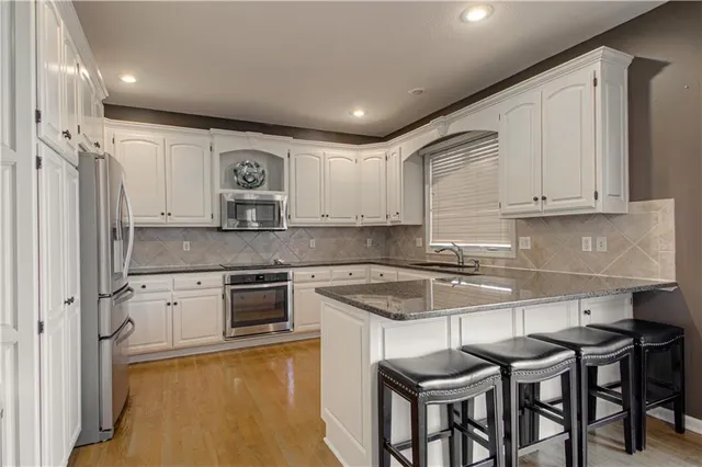 $540,000 | 304 Northeast Hidden Valley Way, Lee's Summit, MO 64064