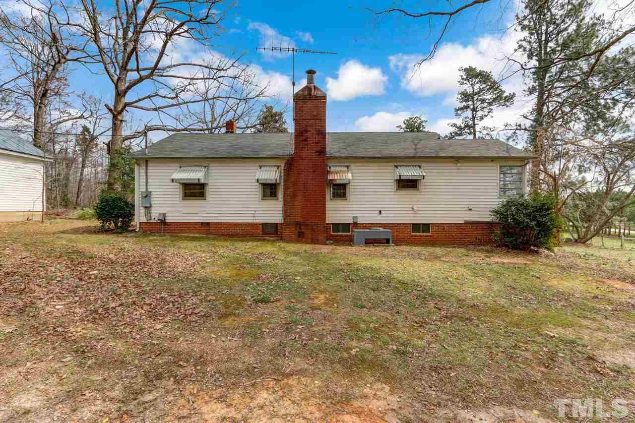 7146 Downsfield Road Randleman, NC 27317 - Photo 23 of 25 a front view of a house with garden