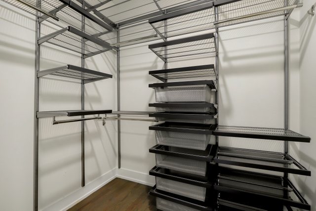 4065 North Sheridan Road, Unit 2N Chicago, IL 60613 - Photo 27 of 34 a storage room with wooden floor