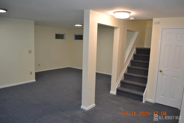 an entryway of a house with stairs