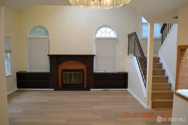 a view of a livingroom with a fireplace