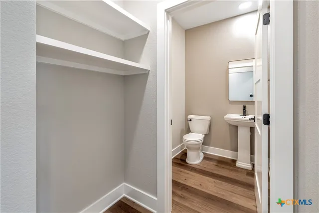 a view of a balcony with a potted plant