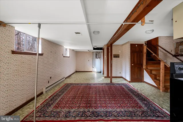 a utility room with a sink a washer and dryer