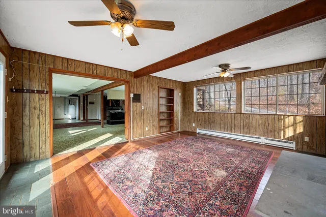 a view of a bathroom from a hallway
