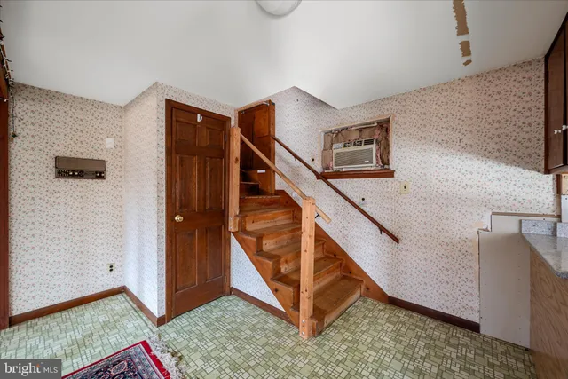 a view of a livingroom with a staircase
