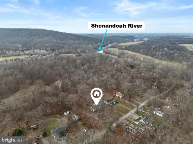 a view of an entryway with a kitchen