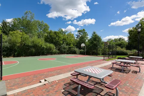 a view of a patio with swimming pool