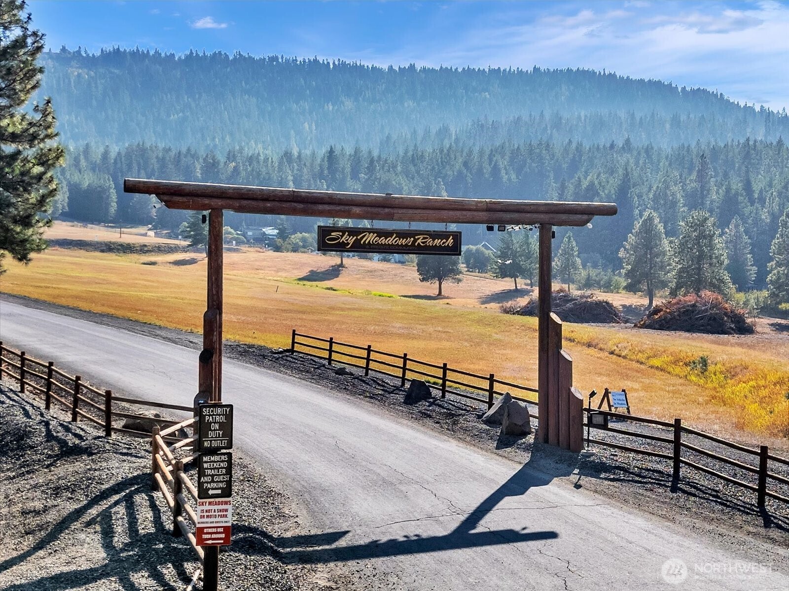 21 Grange Springs Road Cle Elum, WA 98922 - Photo 2 of 31 a view of a swimming pool with a table and chairs