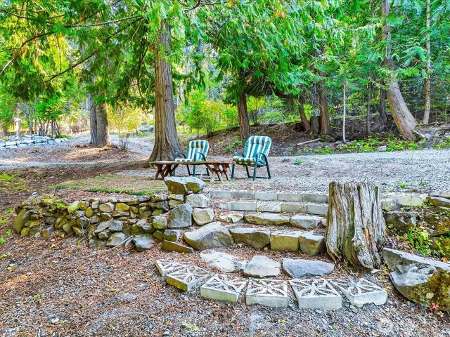 a view of a backyard with a patio