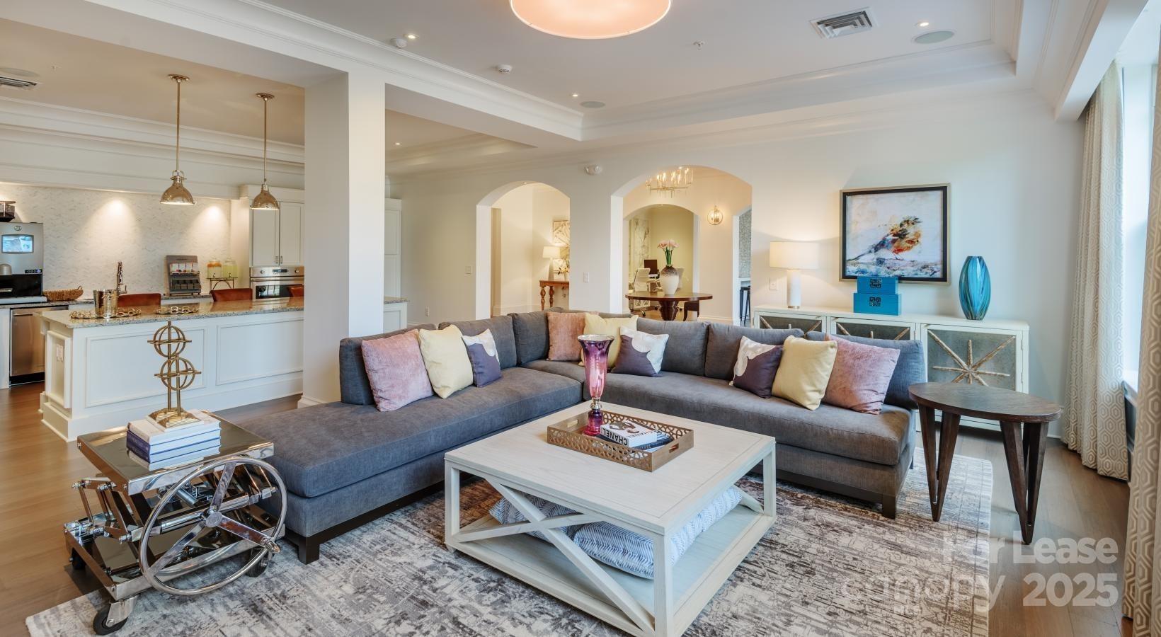 10624 Parrish Street, Unit A1 Matthews, NC 28105 - Photo 26 of 42 a living room with furniture