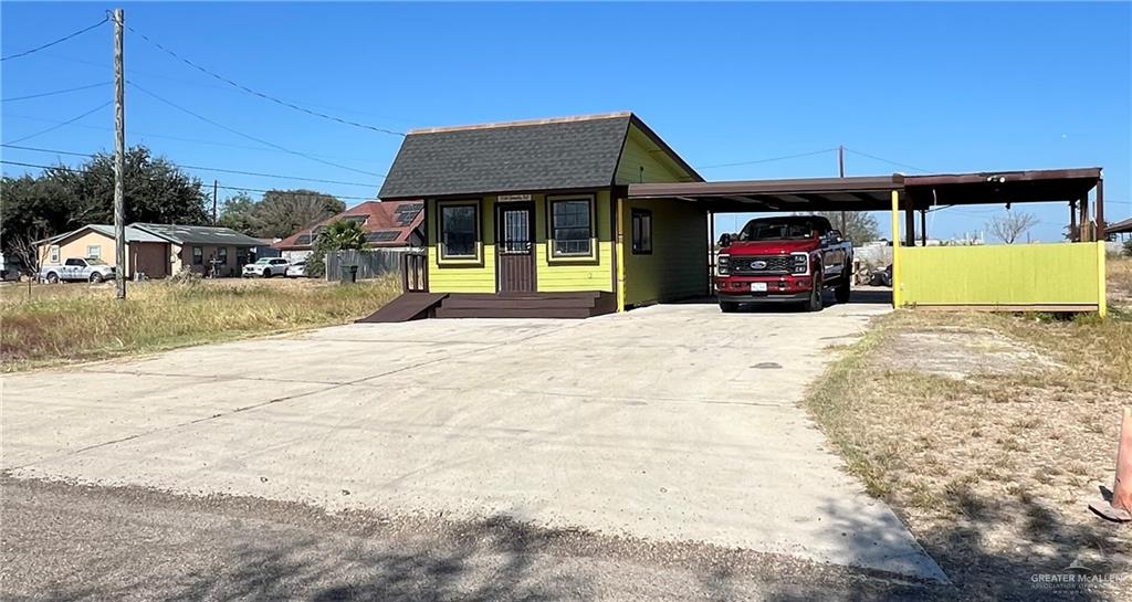 3144 Corrales Road Rio Grande City, TX 78582 - Photo 4 of 9 a view of a house with basket ball court and a fire pit