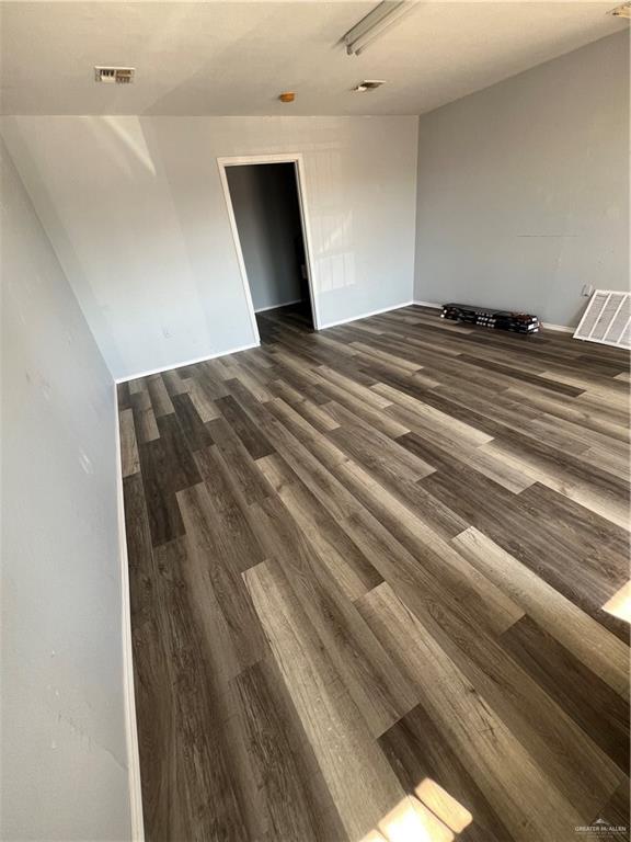 3144 Corrales Road Rio Grande City, TX 78582 - Photo 6 of 9 a view of a room with wooden floor