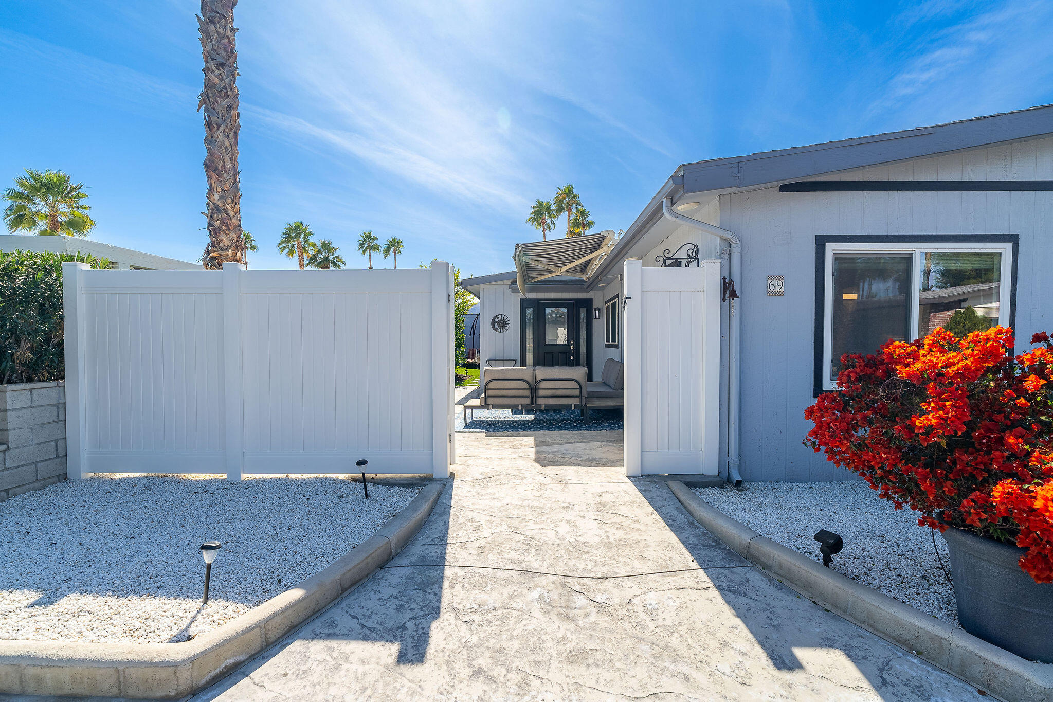69 Rio Street Rancho Mirage, CA 92270 - Photo 4 of 72 Custom vinyl gate