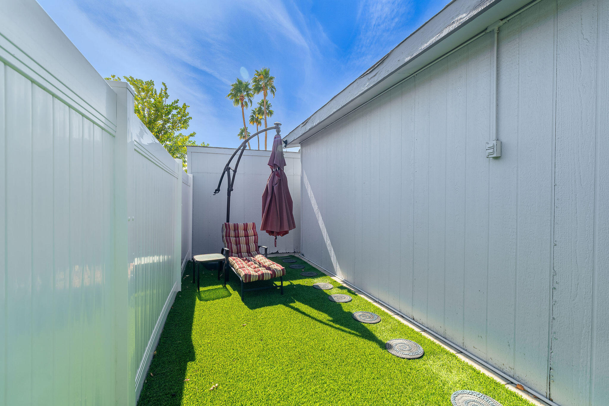 69 Rio Street Rancho Mirage, CA 92270 - Photo 8 of 72 lounging or play area. Artificial turf