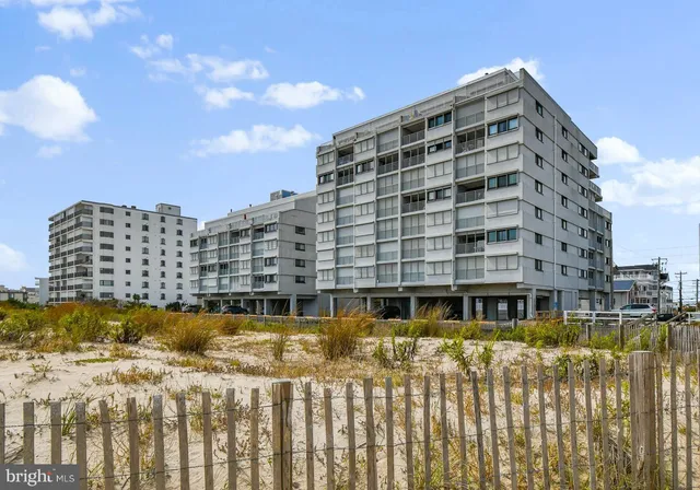 a view of a balcony next to an ocean
