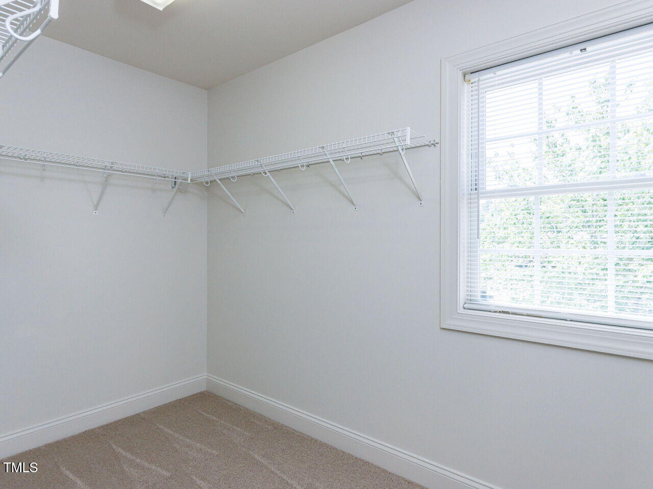 30158 Pharr Chapel Hill, NC 27517 - Photo 26 of 40 a view of a room with rack on the wall and a window
