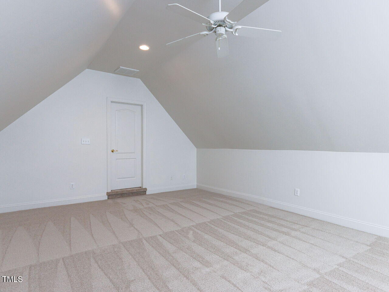 30158 Pharr Chapel Hill, NC 27517 - Photo 28 of 40 en empty room with an entryway and fan