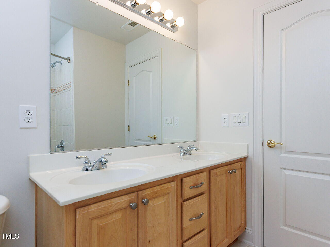 30158 Pharr Chapel Hill, NC 27517 - Photo 31 of 40 a bathroom with a sink and a mirror