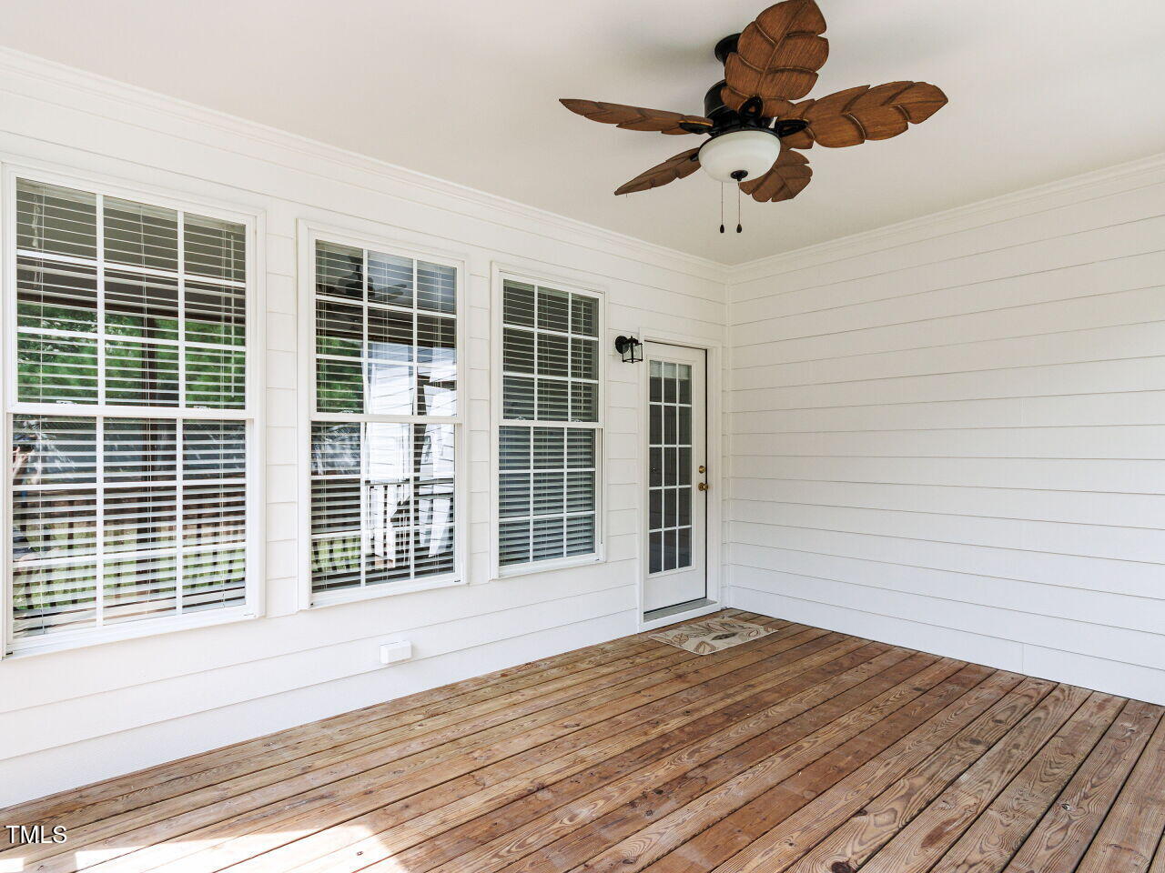 30158 Pharr Chapel Hill, NC 27517 - Photo 36 of 40 a view of empty room with wooden floor and windows