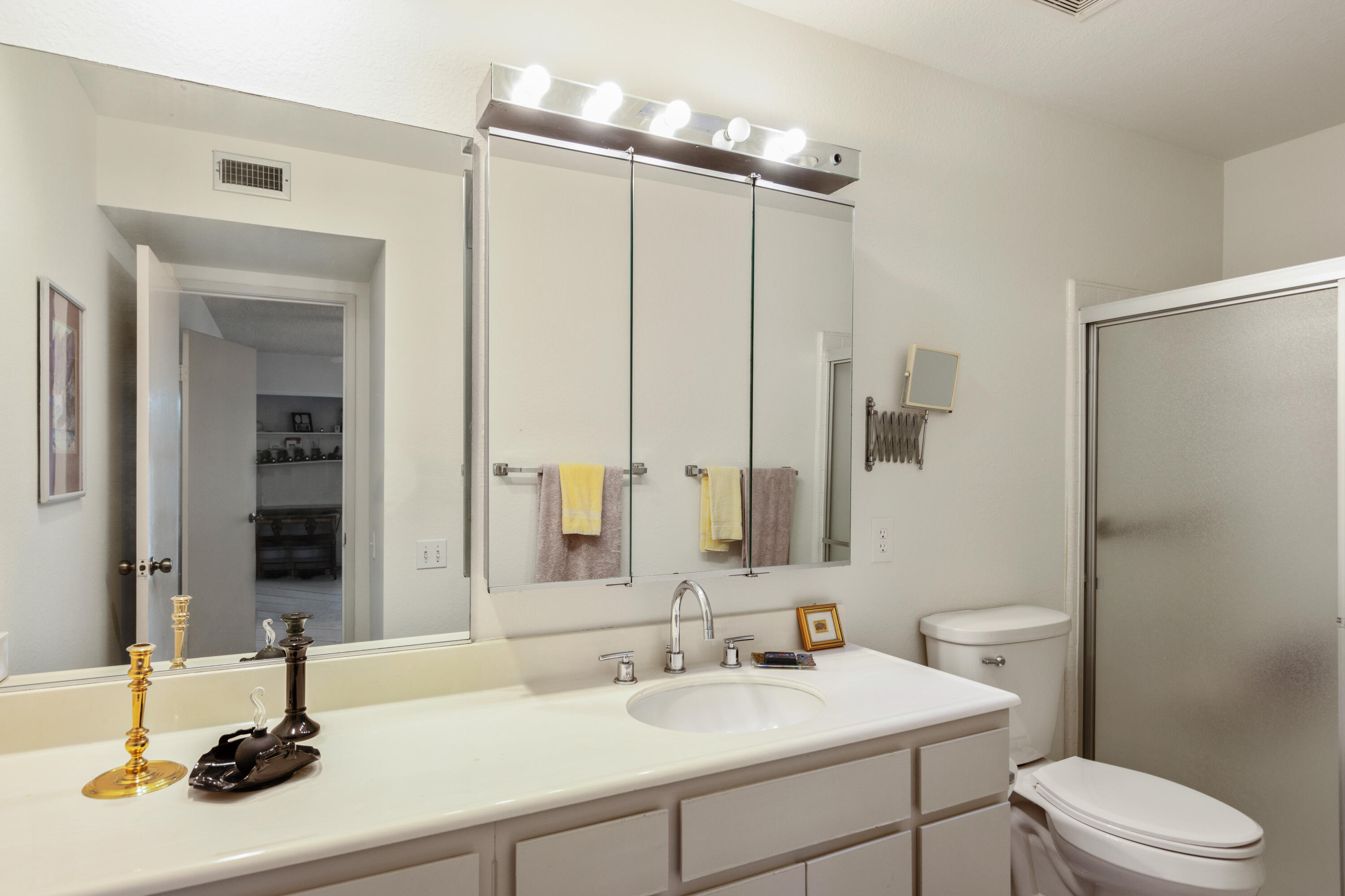 1111 Ramon Road, Unit 28 Palm Springs, CA 92264 - Photo 14 of 28 a bathroom with a sink and a mirror