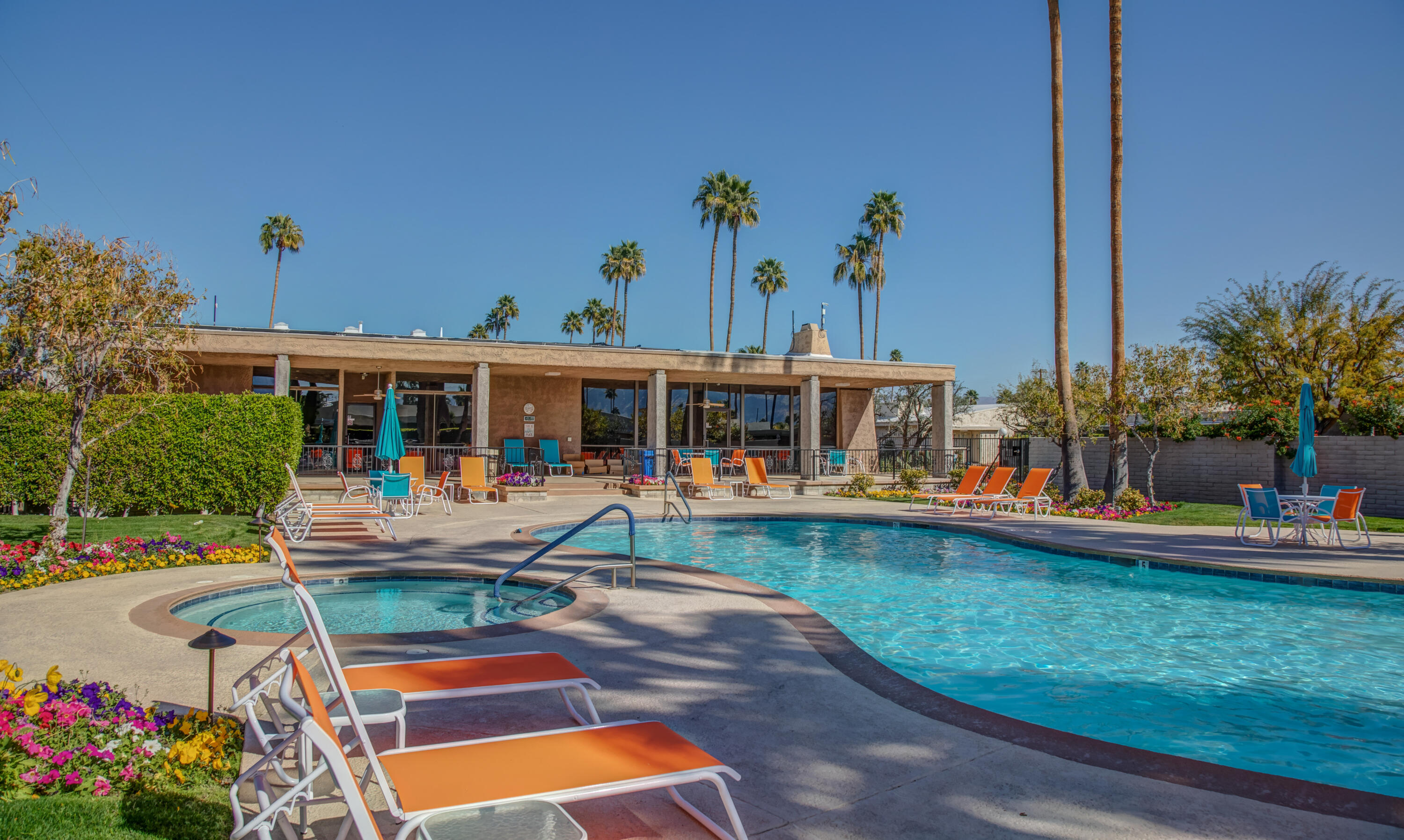 1111 Ramon Road, Unit 28 Palm Springs, CA 92264 - Photo 23 of 28 a view of a house with swimming pool and sitting area