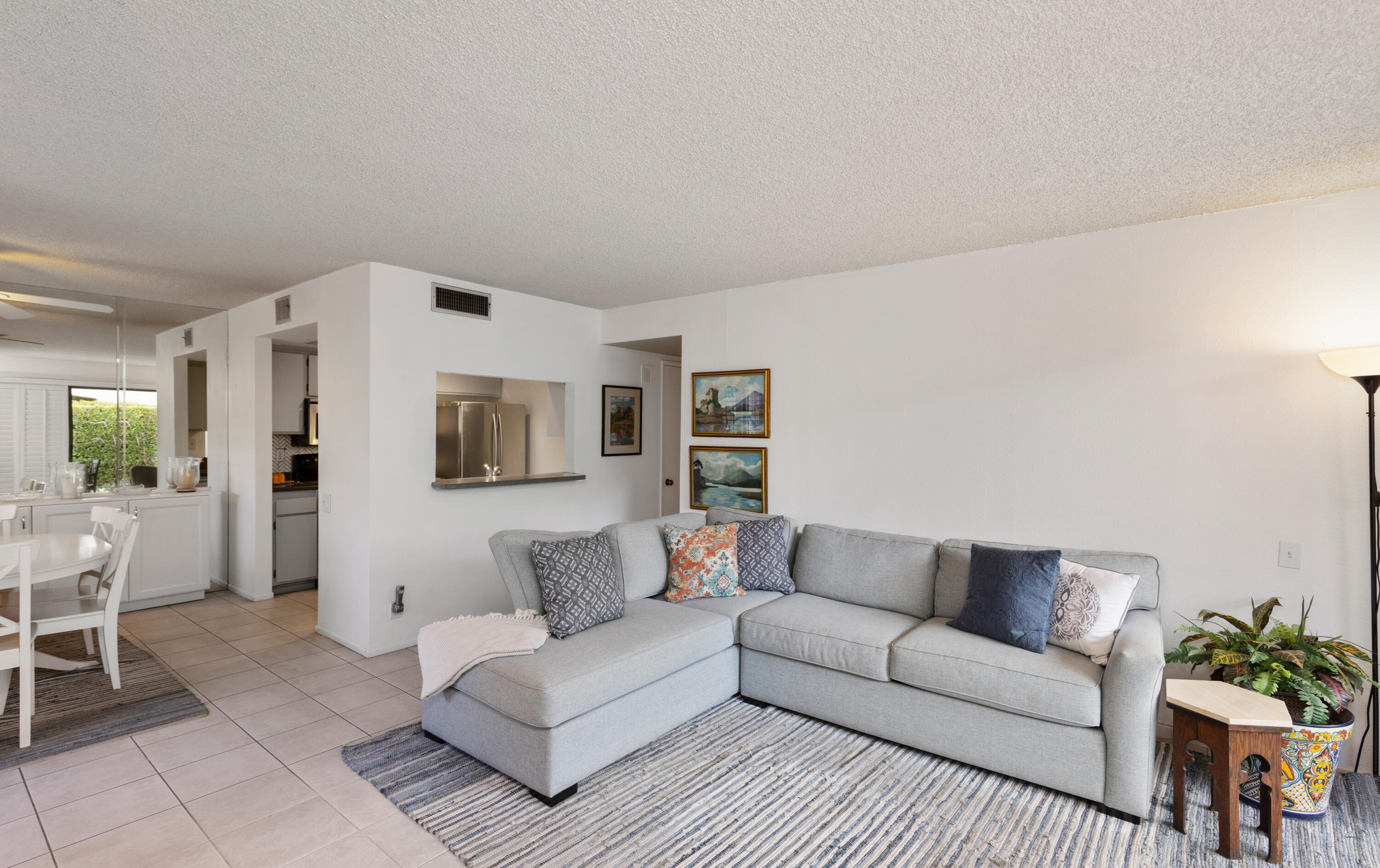 1111 Ramon Road, Unit 28 Palm Springs, CA 92264 - Photo 5 of 28 a living room with furniture and wooden floor