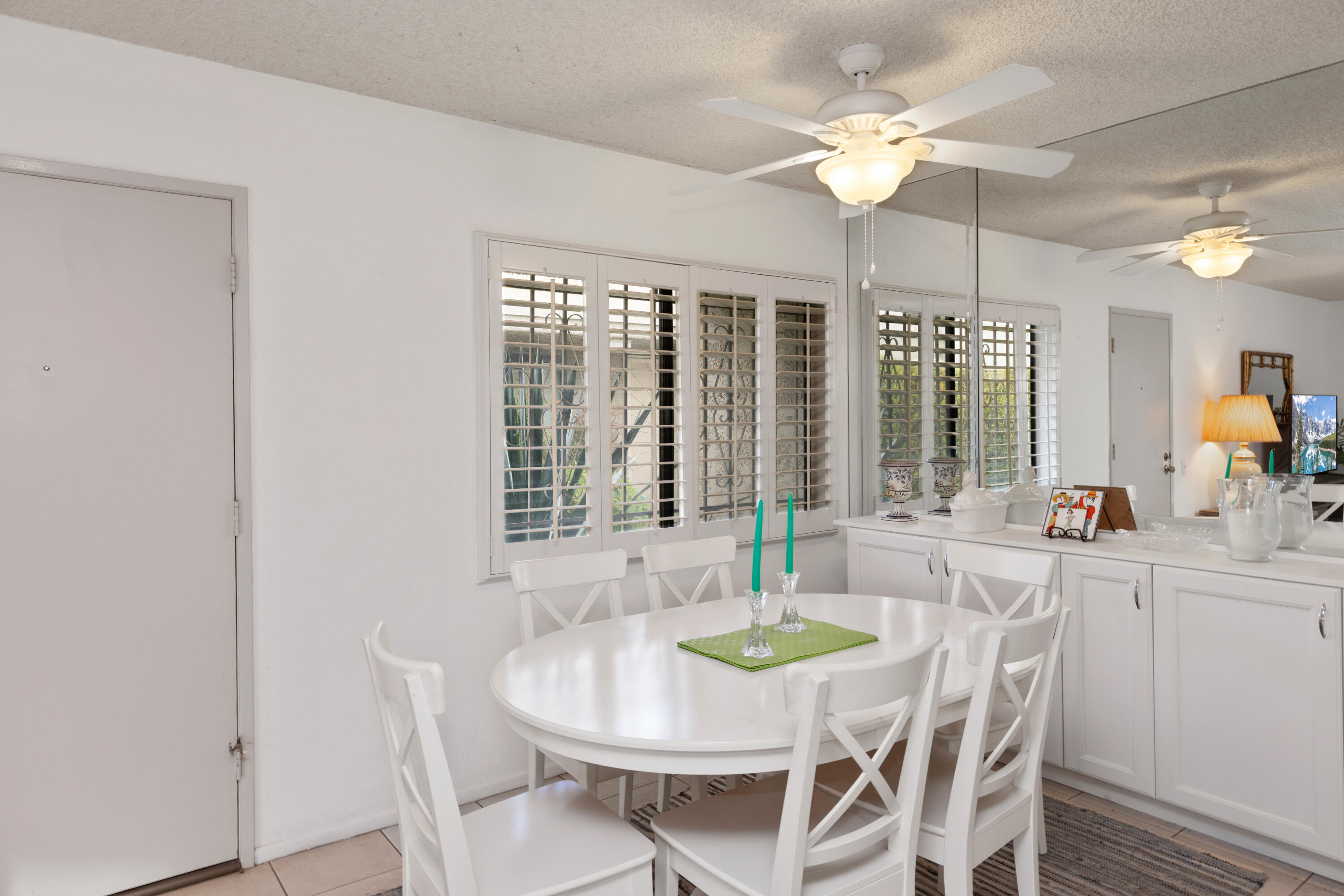 1111 Ramon Road, Unit 28 Palm Springs, CA 92264 - Photo 7 of 28 a view of a dining room with furniture window and outside view
