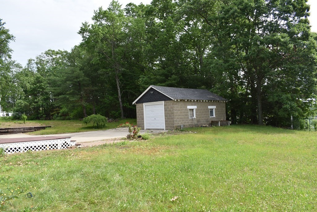 371 Worcester Road Charlton, MA 01507 - Photo 12 of 35 a dirt road with trees in the background