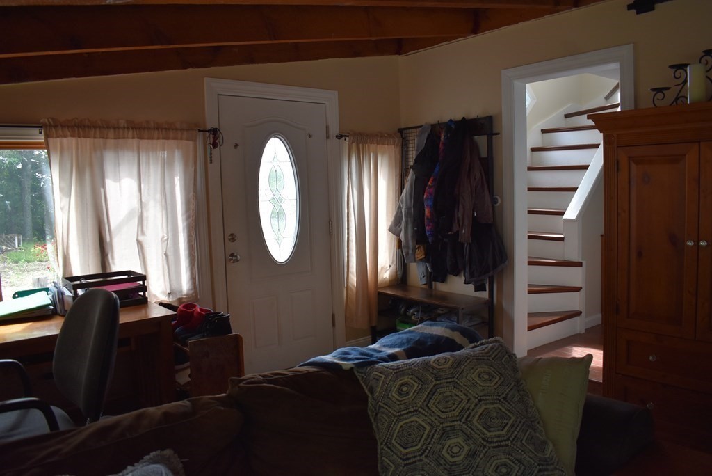 371 Worcester Road Charlton, MA 01507 - Photo 15 of 35 a living room with furniture and a mirror