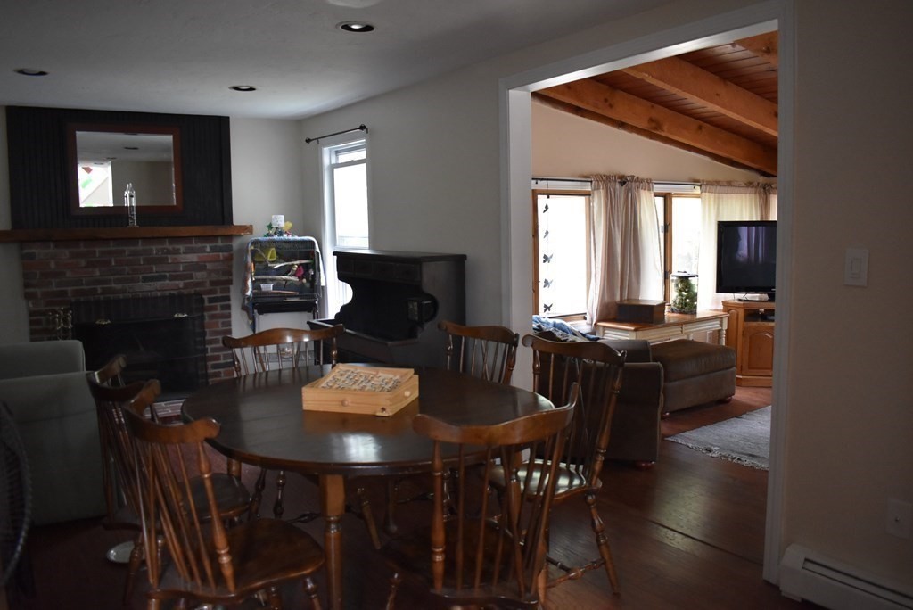 371 Worcester Road Charlton, MA 01507 - Photo 18 of 35 a view of a dining room with furniture and wooden floor