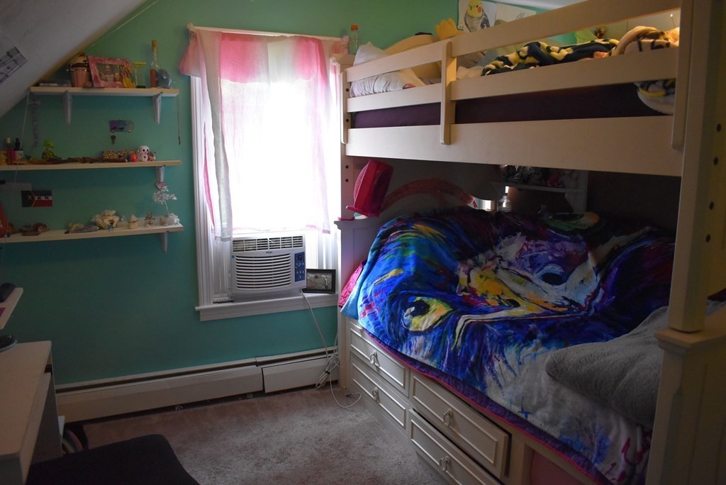 371 Worcester Road Charlton, MA 01507 - Photo 29 of 35 a bedroom with a bed and a window