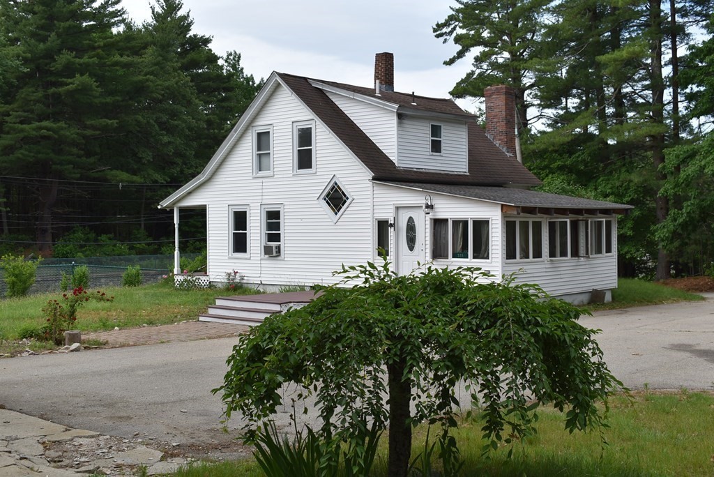 371 Worcester Road Charlton, MA 01507 - Photo 4 of 35 a front view of a house with garden