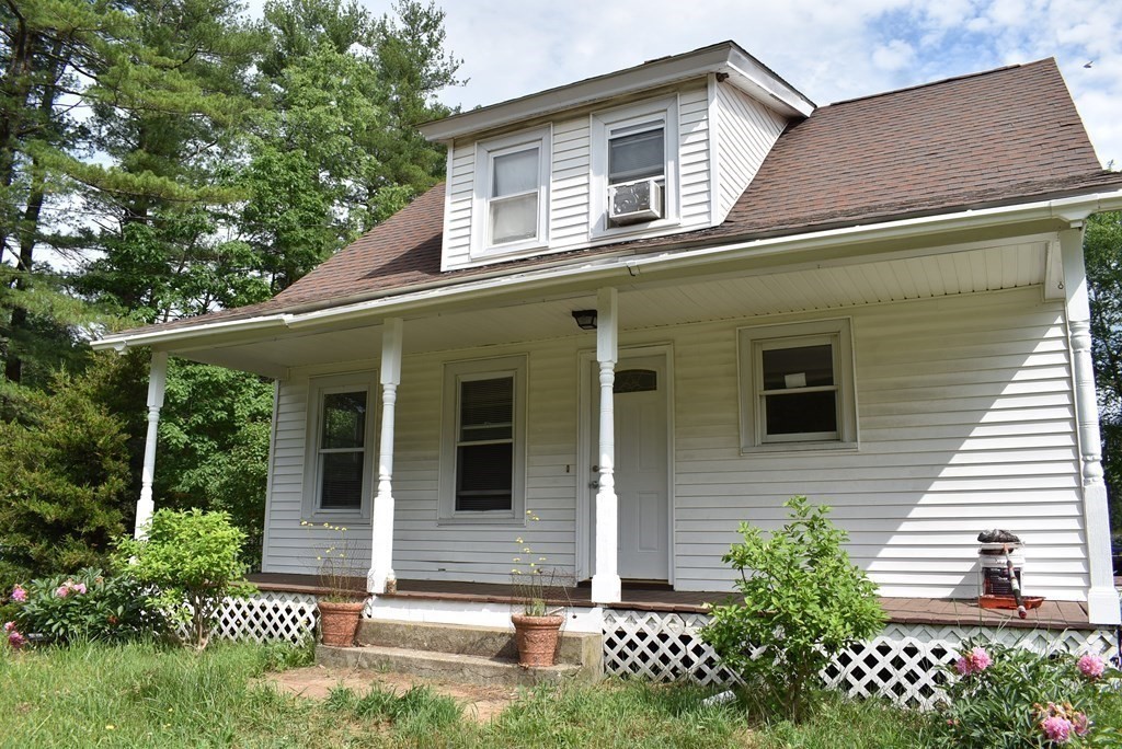371 Worcester Road Charlton, MA 01507 - Photo 5 of 35 a view of a house with a yard