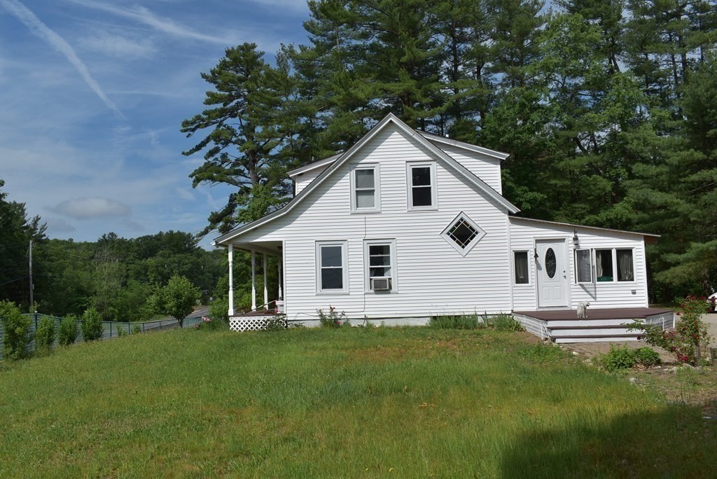 371 Worcester Road Charlton, MA 01507 - Photo 6 of 35 a view of a house with a yard